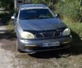 Сірий Деу Ланос, об'ємом двигуна 1.5 л та пробігом 250 тис. км за 1488 $, фото 2 на Automoto.ua