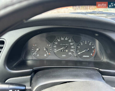 Серый Дэу Ланос, объемом двигателя 1.5 л и пробегом 304 тыс. км за 2600 $, фото 11 на Automoto.ua