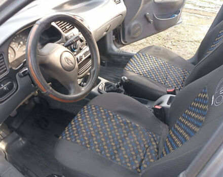 Серый Дэу Ланос, объемом двигателя 1.5 л и пробегом 138 тыс. км за 3100 $, фото 4 на Automoto.ua