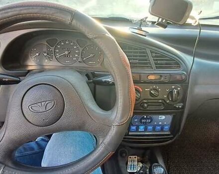 Сірий Деу Ланос, об'ємом двигуна 1.39 л та пробігом 220 тис. км за 3000 $, фото 31 на Automoto.ua