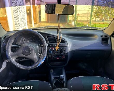 Серый Дэу Ланос, объемом двигателя 1.5 л и пробегом 300 тыс. км за 1900 $, фото 9 на Automoto.ua