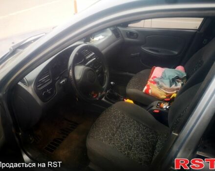 Серый Дэу Ланос, объемом двигателя 1.5 л и пробегом 345 тыс. км за 1800 $, фото 3 на Automoto.ua