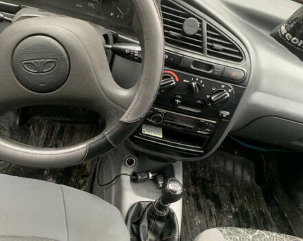 Сірий Деу Ланос, об'ємом двигуна 1.39 л та пробігом 189 тис. км за 1450 $, фото 9 на Automoto.ua
