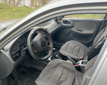 Сірий Деу Ланос, об'ємом двигуна 1.5 л та пробігом 206 тис. км за 1381 $, фото 6 на Automoto.ua