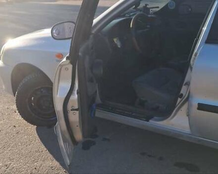 Сірий Деу Ланос, об'ємом двигуна 1.39 л та пробігом 220 тис. км за 3000 $, фото 7 на Automoto.ua