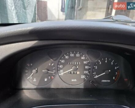 Сірий Деу Ланос, об'ємом двигуна 1.6 л та пробігом 221 тис. км за 2399 $, фото 4 на Automoto.ua