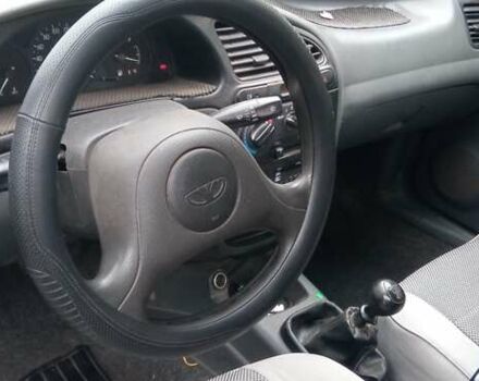 Сірий Деу Ланос, об'ємом двигуна 1.39 л та пробігом 135 тис. км за 2800 $, фото 7 на Automoto.ua