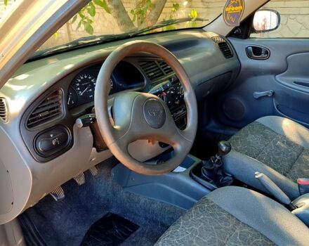 Серый Дэу Ланос, объемом двигателя 1.4 л и пробегом 57 тыс. км за 2200 $, фото 7 на Automoto.ua