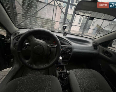 Деу Ланос 2008 у Сарнах на Automoto.ua Сірий Деу Ланос, об'ємом двигуна 1.5 л та пробігом 80 тис. км за 3050 $, фото 6 на Automoto.ua