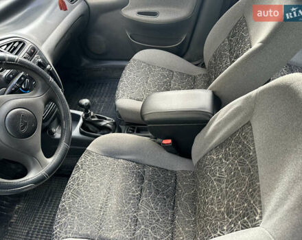 Серый Дэу Ланос, объемом двигателя 1.5 л и пробегом 304 тыс. км за 2600 $, фото 12 на Automoto.ua