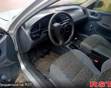 Серый Дэу Ланос, объемом двигателя 1.4 л и пробегом 240 тыс. км за 1700 $, фото 7 на Automoto.ua