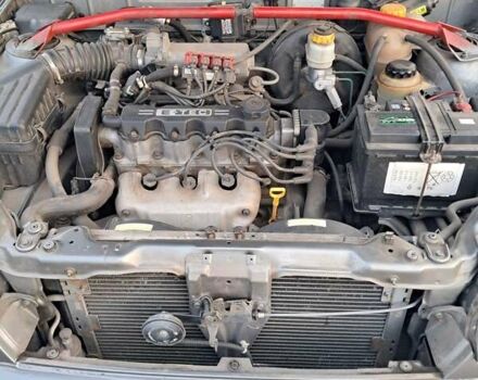 Сірий Деу Ланос, об'ємом двигуна 1.5 л та пробігом 147 тис. км за 2500 $, фото 4 на Automoto.ua