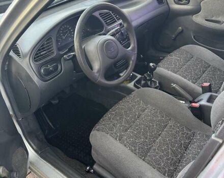 Серый Дэу Ланос, объемом двигателя 1.5 л и пробегом 225 тыс. км за 2400 $, фото 4 на Automoto.ua