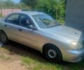 Сірий Деу Ланос, об'ємом двигуна 1.39 л та пробігом 145 тис. км за 1900 $, фото 1 на Automoto.ua