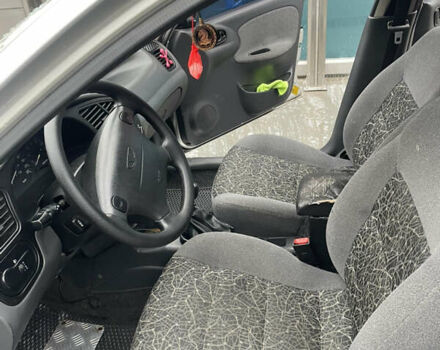 Сірий Деу Ланос, об'ємом двигуна 1.6 л та пробігом 139 тис. км за 3100 $, фото 4 на Automoto.ua