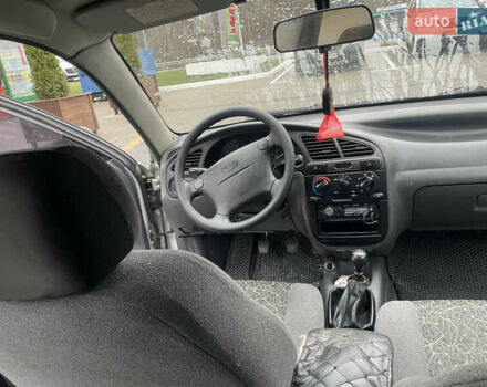 Сірий Деу Ланос, об'ємом двигуна 1.6 л та пробігом 139 тис. км за 3100 $, фото 6 на Automoto.ua