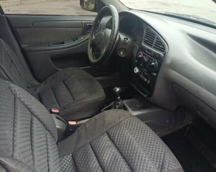 Серый Дэу Ланос, объемом двигателя 1.5 л и пробегом 224 тыс. км за 2400 $, фото 2 на Automoto.ua