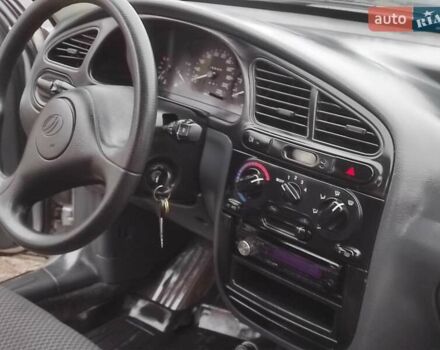 Серый Дэу Ланос, объемом двигателя 1.5 л и пробегом 156 тыс. км за 1950 $, фото 6 на Automoto.ua