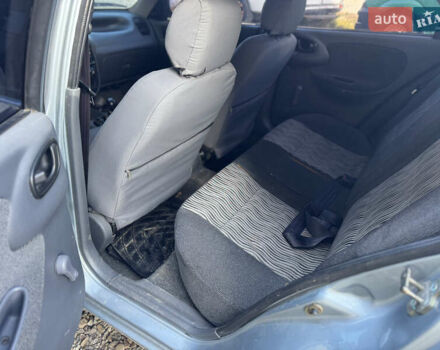 Сірий Деу Ланос, об'ємом двигуна 1.35 л та пробігом 200 тис. км за 1399 $, фото 5 на Automoto.ua