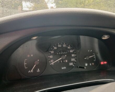 Сірий Деу Ланос, об'ємом двигуна 1.5 л та пробігом 236 тис. км за 1450 $, фото 2 на Automoto.ua