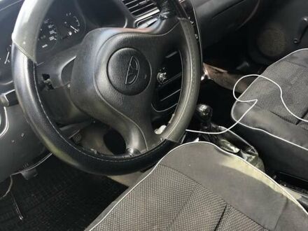 Серый Дэу Ланос, объемом двигателя 1.3 л и пробегом 265 тыс. км за 2000 $, фото 1 на Automoto.ua