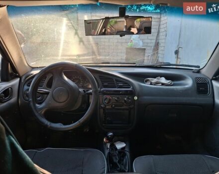Сірий Деу Ланос, об'ємом двигуна 1.5 л та пробігом 312 тис. км за 800 $, фото 1 на Automoto.ua