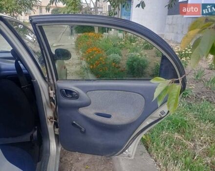 Сірий Деу Ланос, об'ємом двигуна 1.5 л та пробігом 100 тис. км за 1300 $, фото 1 на Automoto.ua