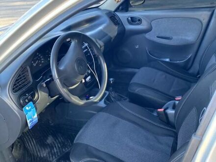 Сірий Деу Ланос, об'ємом двигуна 1.5 л та пробігом 259 тис. км за 2000 $, фото 1 на Automoto.ua