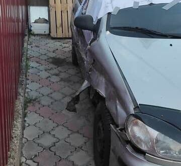 Сірий Деу Ланос, об'ємом двигуна 1.5 л та пробігом 143 тис. км за 1500 $, фото 1 на Automoto.ua