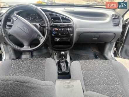 Серый Дэу Ланос, объемом двигателя 1.6 л и пробегом 230 тыс. км за 2000 $, фото 1 на Automoto.ua