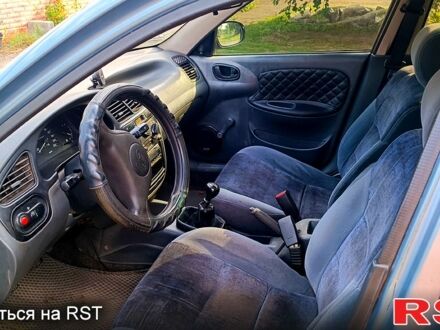 Деу Ланос 2008 у Павлограде на Automoto.ua Сірий Деу Ланос, об'ємом двигуна 1.4 л та пробігом 133 тис. км за 2000 $, фото 1 на Automoto.ua