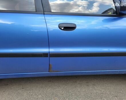 Синий Дэу Ланос, объемом двигателя 0 л и пробегом 190 тыс. км за 3300 $, фото 4 на Automoto.ua