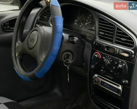 Синий Дэу Ланос, объемом двигателя 1.5 л и пробегом 230 тыс. км за 2799 $, фото 21 на Automoto.ua