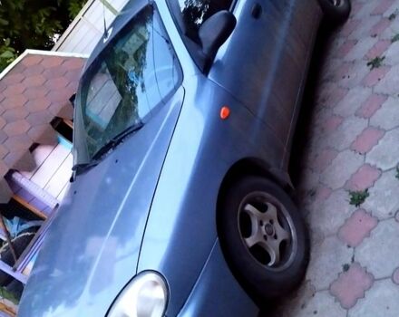 Синий Дэу Ланос, объемом двигателя 1.5 л и пробегом 300 тыс. км за 1350 $, фото 1 на Automoto.ua