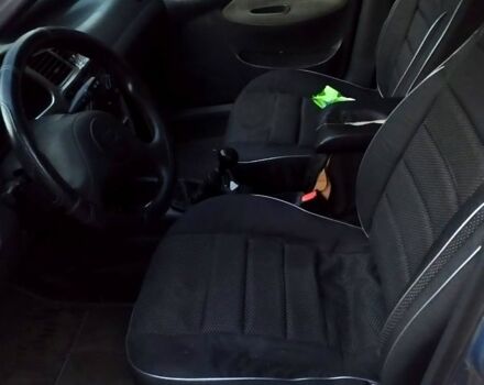 Синий Дэу Ланос, объемом двигателя 1.5 л и пробегом 300 тыс. км за 1350 $, фото 5 на Automoto.ua