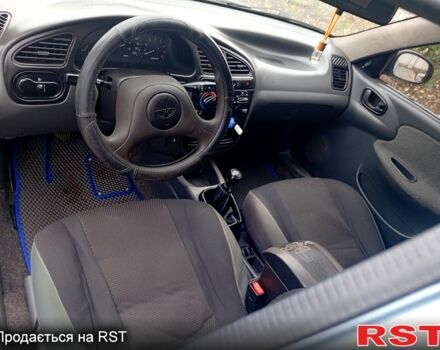 Синий Дэу Ланос, объемом двигателя 1.5 л и пробегом 220 тыс. км за 2000 $, фото 4 на Automoto.ua