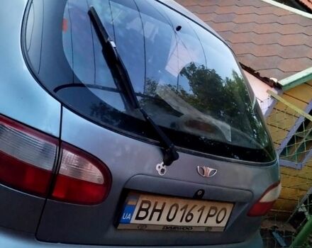 Синий Дэу Ланос, объемом двигателя 1.5 л и пробегом 300 тыс. км за 1350 $, фото 6 на Automoto.ua