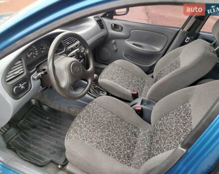 Синий Дэу Ланос, объемом двигателя 1.5 л и пробегом 126 тыс. км за 2750 $, фото 9 на Automoto.ua