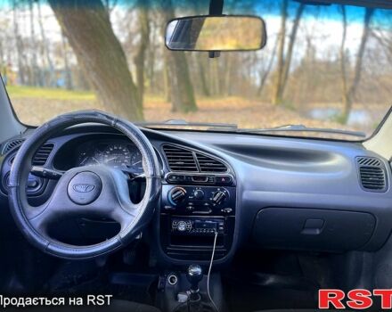 Синий Дэу Ланос, объемом двигателя 1.5 л и пробегом 375 тыс. км за 1750 $, фото 6 на Automoto.ua