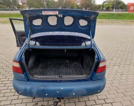 Синій Деу Ланос, об'ємом двигуна 1.5 л та пробігом 560 тис. км за 1100 $, фото 11 на Automoto.ua