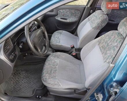 Синий Дэу Ланос, объемом двигателя 1.5 л и пробегом 180 тыс. км за 2900 $, фото 3 на Automoto.ua