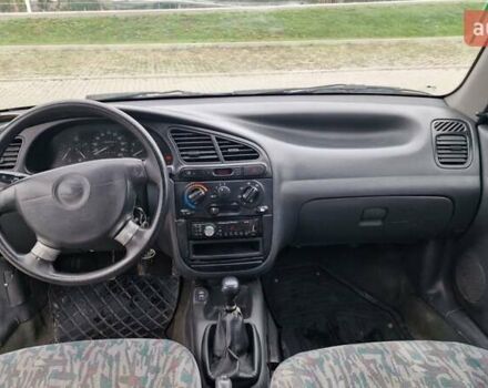 Синій Деу Ланос, об'ємом двигуна 1.5 л та пробігом 560 тис. км за 1100 $, фото 6 на Automoto.ua