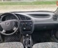 Синій Деу Ланос, об'ємом двигуна 1.5 л та пробігом 560 тис. км за 1100 $, фото 6 на Automoto.ua