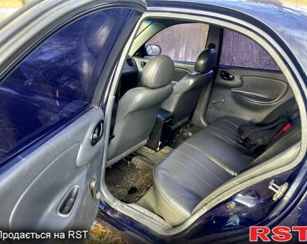 Синий Дэу Ланос, объемом двигателя 1.5 л и пробегом 375 тыс. км за 1750 $, фото 2 на Automoto.ua