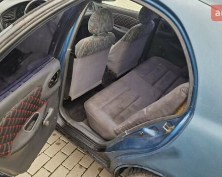 Синій Деу Ланос, об'ємом двигуна 1.5 л та пробігом 560 тис. км за 1100 $, фото 7 на Automoto.ua