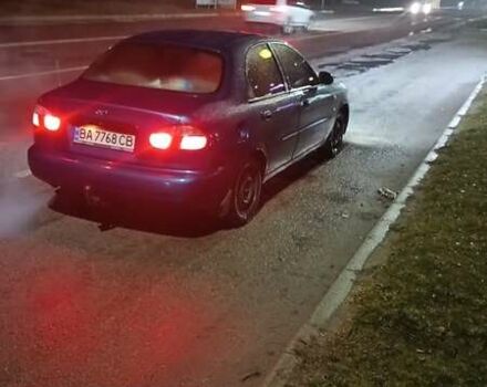 Синий Дэу Ланос, объемом двигателя 1.5 л и пробегом 350 тыс. км за 1500 $, фото 5 на Automoto.ua