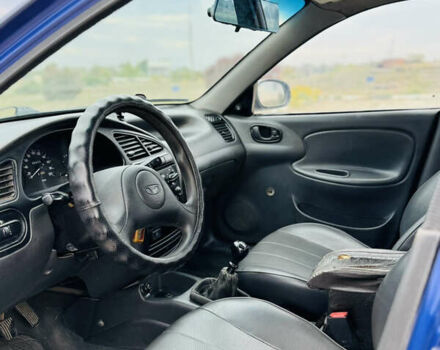 Синий Дэу Ланос, объемом двигателя 1.5 л и пробегом 145 тыс. км за 1400 $, фото 8 на Automoto.ua