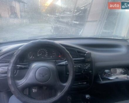 Синий Дэу Ланос, объемом двигателя 1.5 л и пробегом 315 тыс. км за 1300 $, фото 9 на Automoto.ua