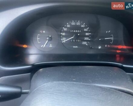 Синий Дэу Ланос, объемом двигателя 1.5 л и пробегом 315 тыс. км за 1300 $, фото 8 на Automoto.ua