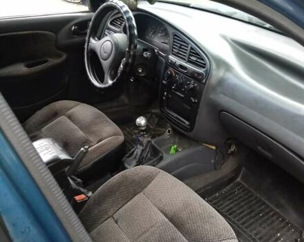 Синій Деу Ланос, об'ємом двигуна 1.5 л та пробігом 240 тис. км за 2300 $, фото 1 на Automoto.ua